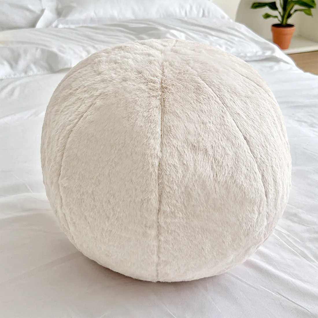 The actual PilouPillow product in cream
